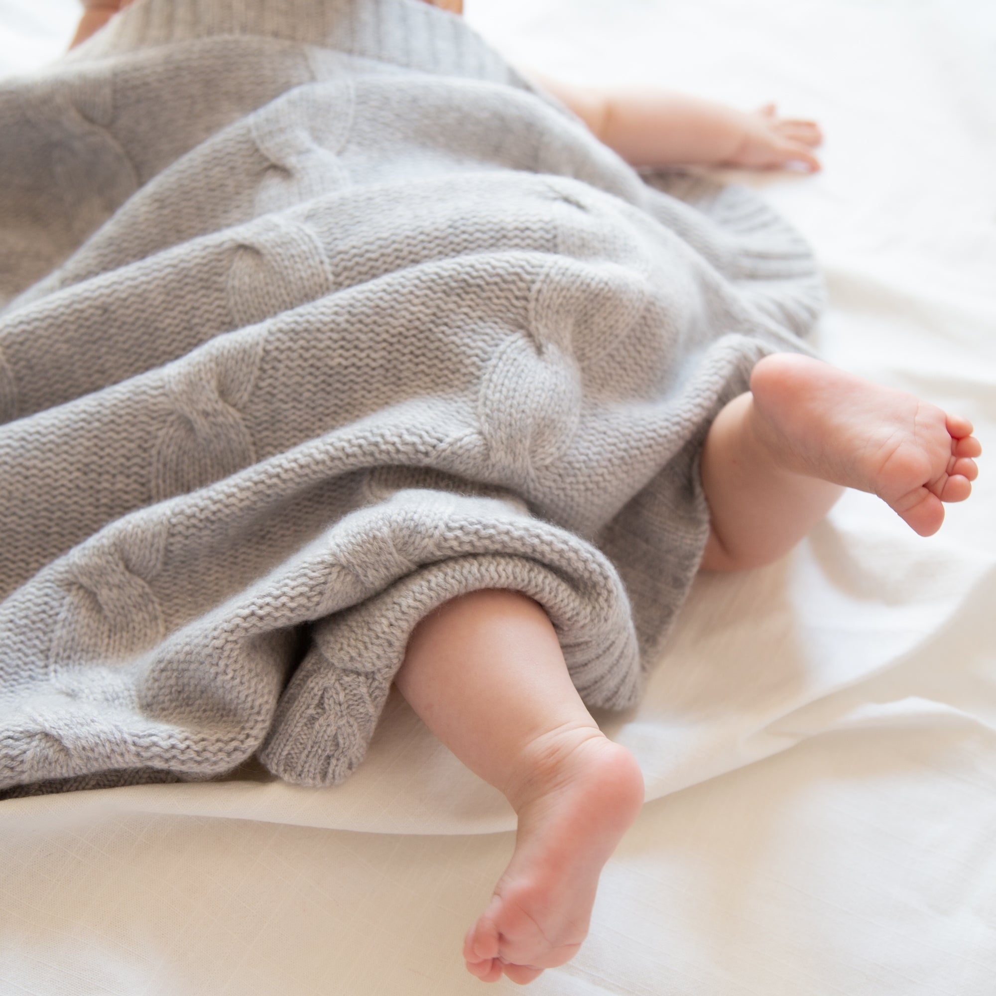 JULES cashmere baby blanket with cable-knit pattern