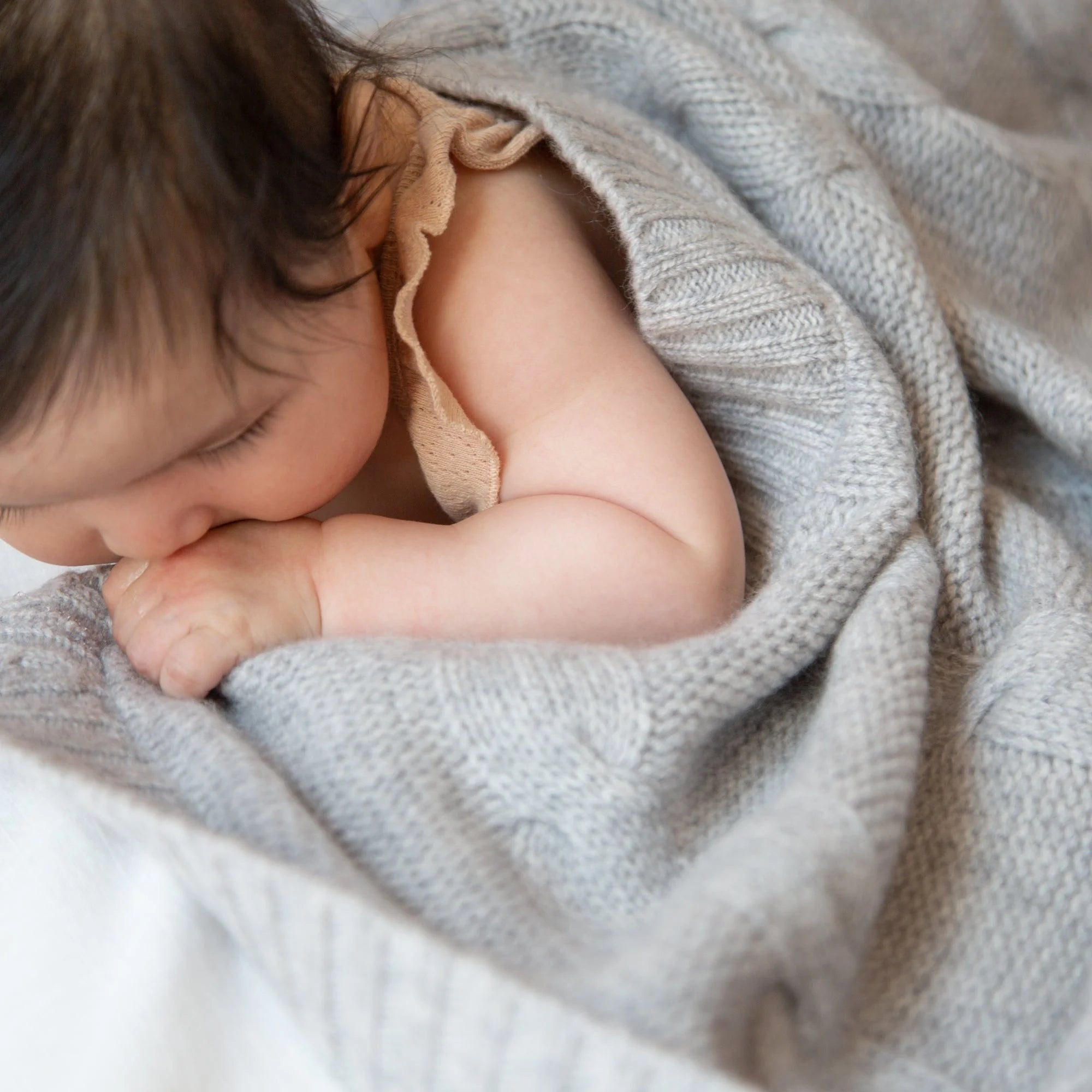 JULES cashmere baby blanket with cable-knit pattern